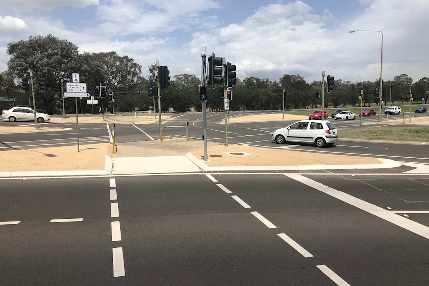 A multi-lane intersection on Belconnen Way in Canberra.