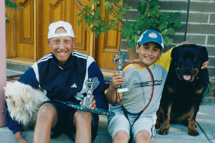 Nick Kyrgios and his brother Christos and their dogs