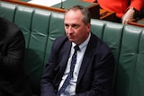 A dejected Barnaby Joyce sits in Parliament.