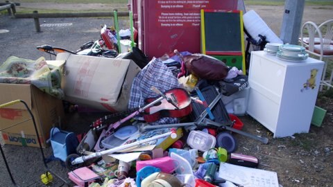 Charity workers find tonnes of rubbish dumped outside collection bins across Canberra each year. Most of the items are not useable and have to be taken to the tip.