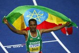 Ethiopia's Kenenisa Bekele celebrates his victory in the 10,000 metres final