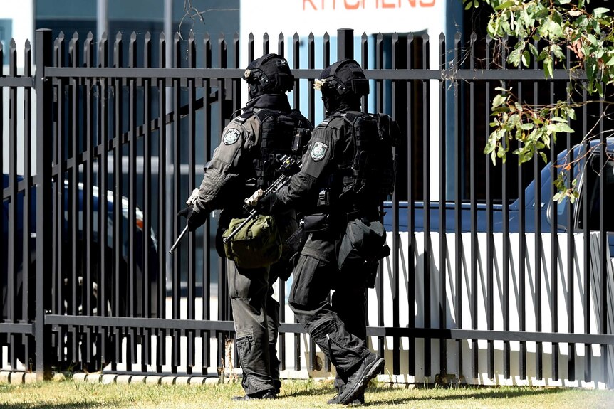 Tactical police at a shooting at Ingleburn on Monday, March 7