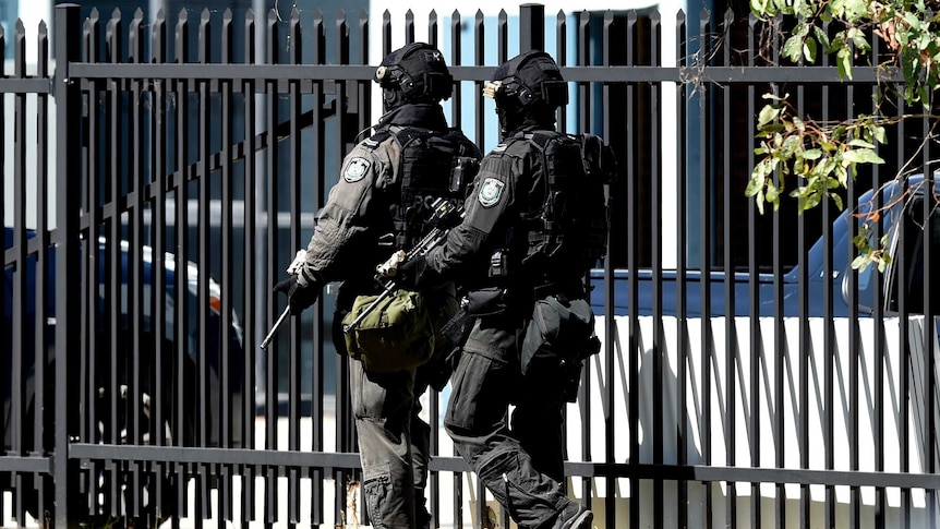 Tactical police at a shooting at Ingleburn on Monday, March 7