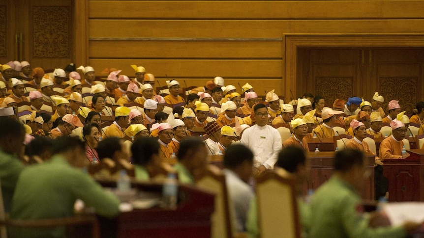 Myanmar's new pro-democracy MPs take their seats in parliament for the first time