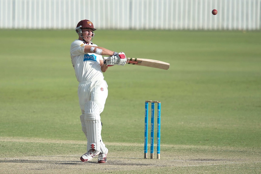 Queensland batsman Chris Lynn plays a shot against NSW in the Sheffield Shield in November 2013.