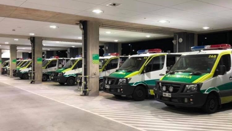 Ambulances parked outside the Royal Adelaide Hospital waiting to drop off patients.