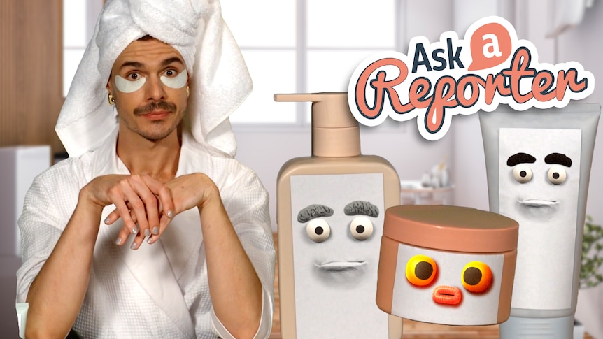 Jack wearing a bathroom robe and his hair in a towel. Three containers with cgi plasticine faces on them.