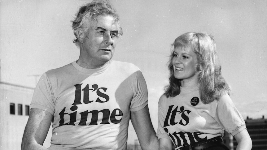 A historic photo of Gough Whitlam wearing an 'It's Time' t-shirt