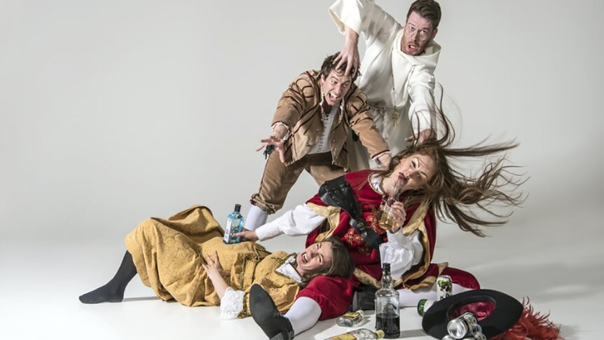 A chaotic group of actors in Shakespearean costume