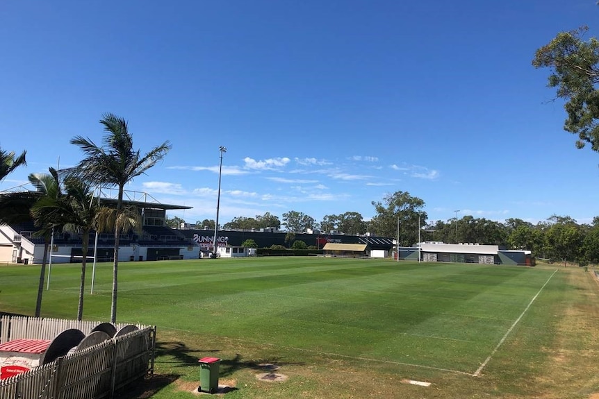 A rugby league field with a grandstand and clubhouse.