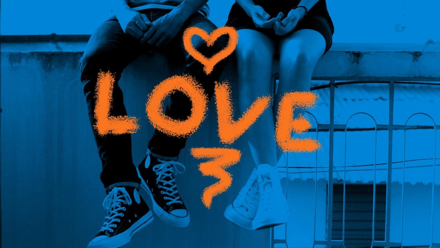 A photo of a young high school sweethearts sitting on a bench,  with the word love emblazoned across the image.