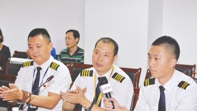 Heroic Sichuan Airlines pilot Liu Chuanjian at a press conference after saving his co-pilot's life