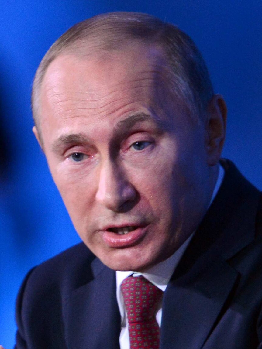 Vladimir Putin discusses the plan to ban US adoptions at a media conference, December 20, 2012.