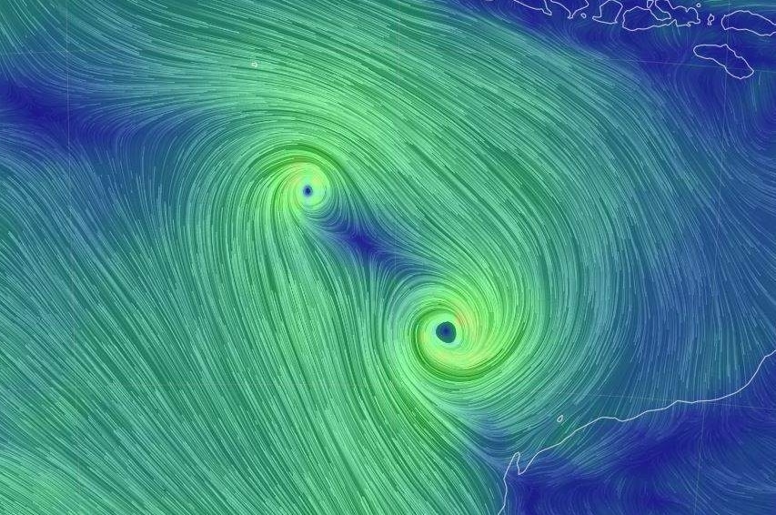Wind map showing two low pressure systems spinning off the NW WA coast.