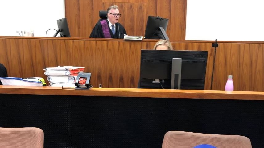 A Judge sitting in a court practicing physical distancing during Covid-19 pandemic