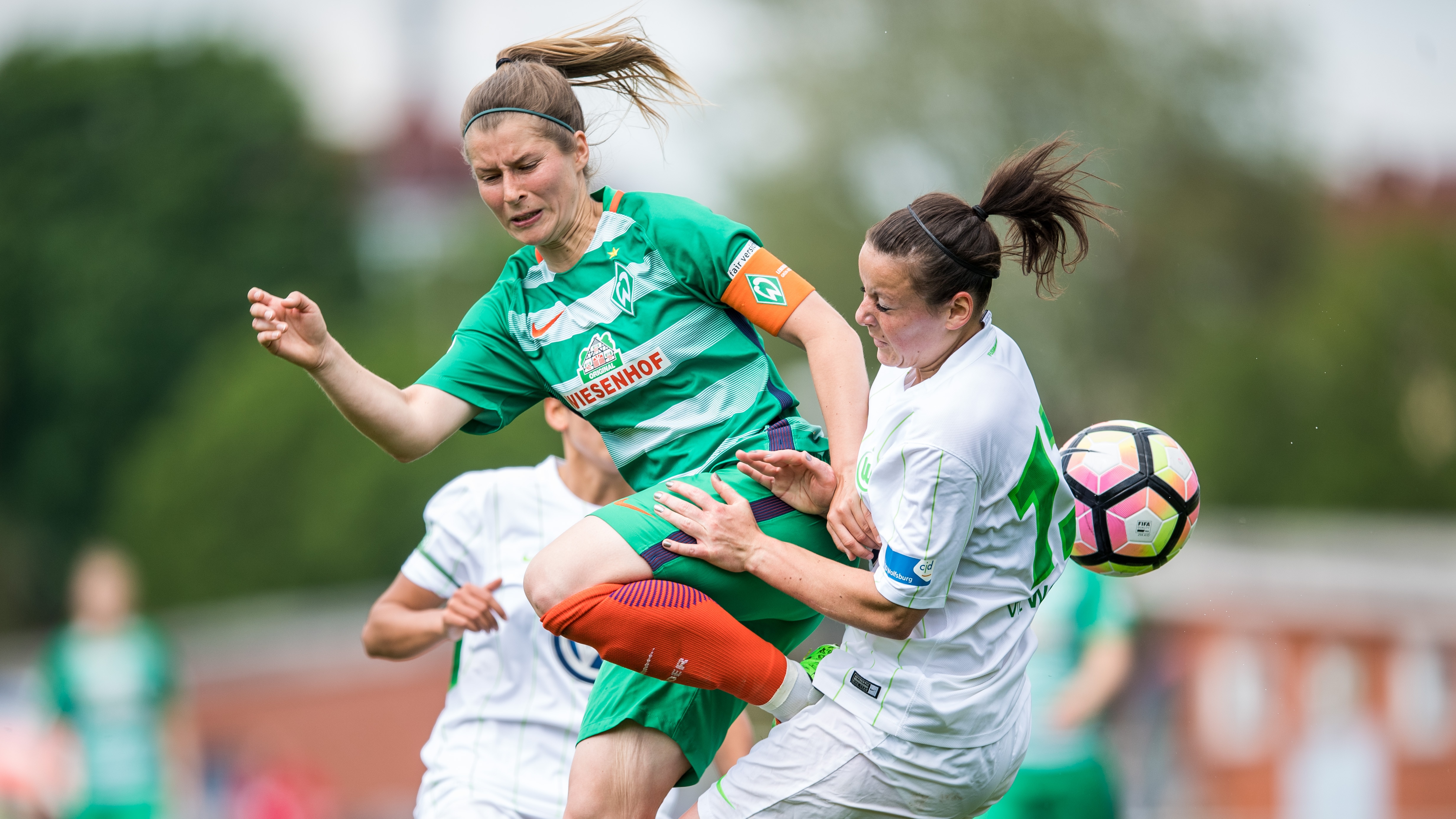 Marie-Louise Eta challenges for the ball