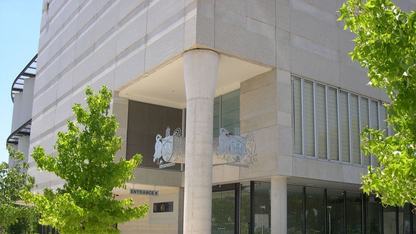 A protective services officer with the Australian Federal Police has been refused bail after being charged with stalking in Canberra.