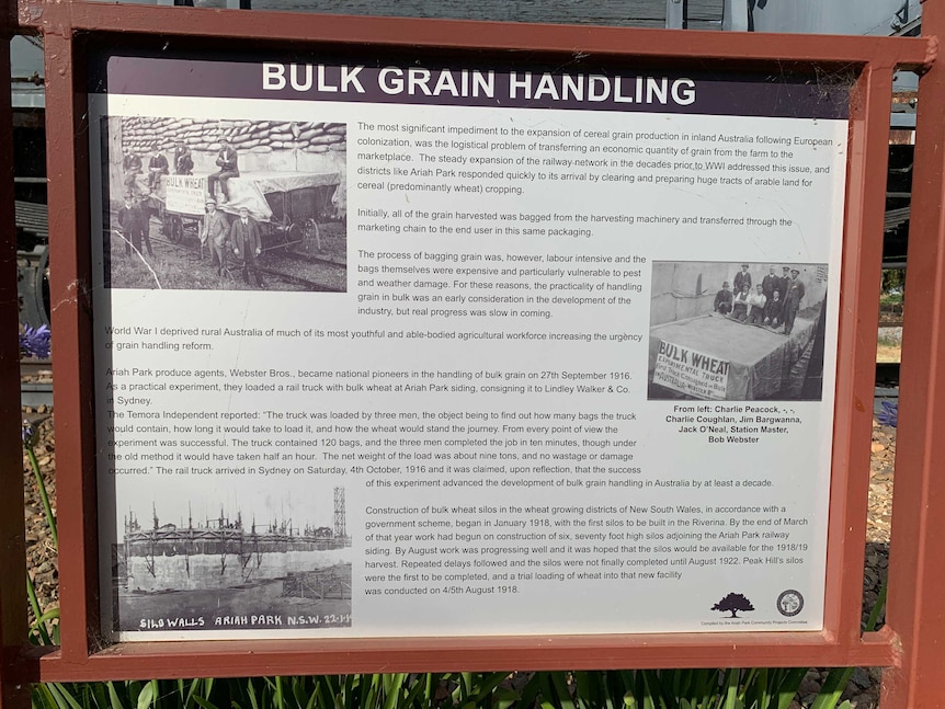 A sign explaining the history of bulk grain handling.