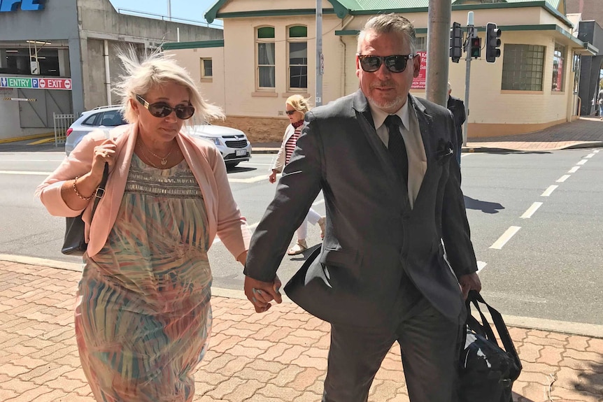 Rob Messenger and his wife Fern arrive at court