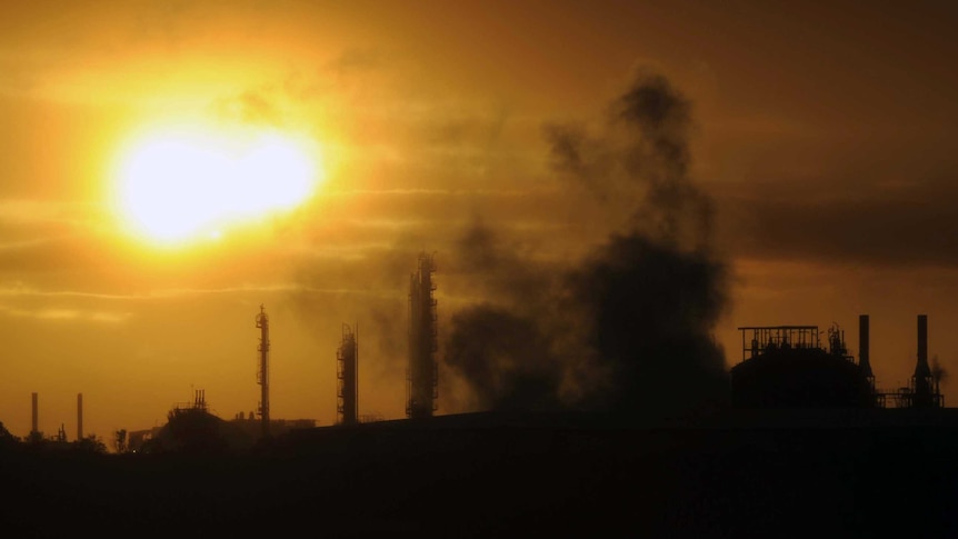 Emissions rise from an industrial plant in Melbourne on April 29, 2014.