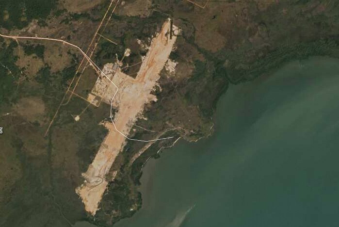 A satellite image of an airport under construction
