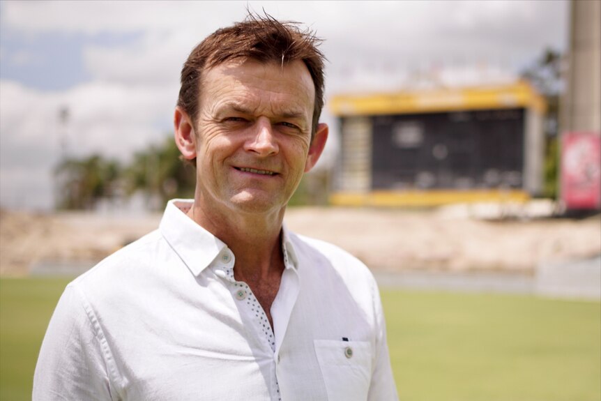 Adam Gilchrist stands on the WACA with a scoreboard over his left shoulder