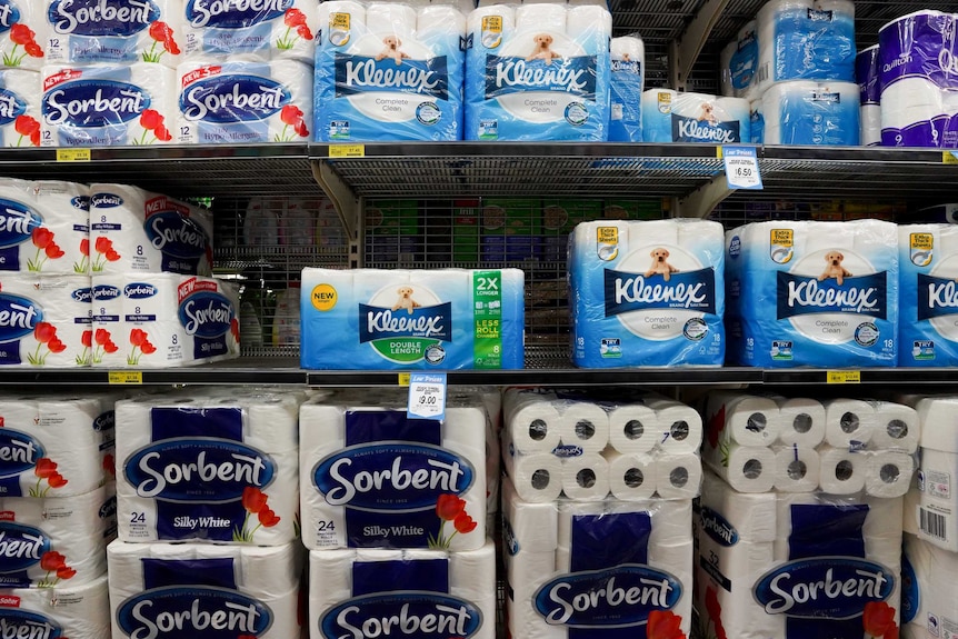 toilet paper on supermarket shelves