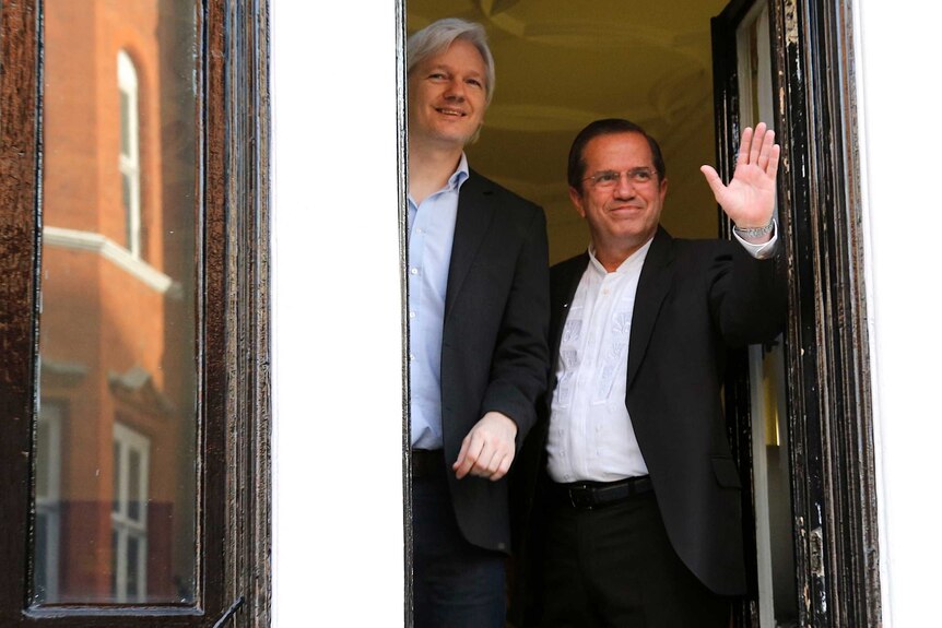 Julian Assange appears with Ecuadorian foreign minister Ricardo Patino