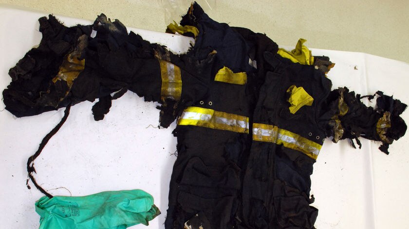The firefighters' union says the clothing worn by a firefighter badly burnt in a factory fire was unsafe.