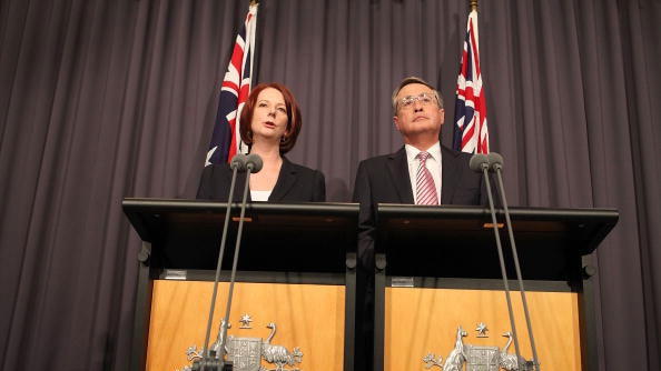 Julia Gillard and Wayne Swan speak during a press conference at National Press Club on August 25, 2010 in Canberra