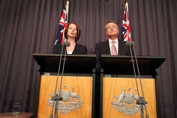 Julia Gillard and Wayne Swan speak during a press conference at National Press Club. (Getty Images: Cole Bennetts)
