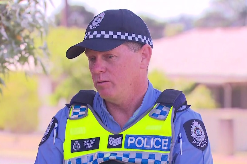 A WA police officer in a high-vis vest