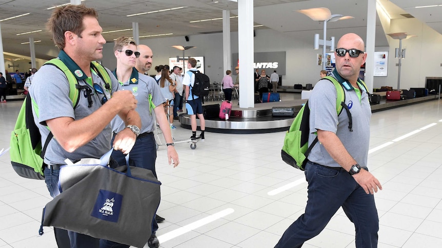 Darren Lehmann, Ryan Harris and Steve Smith arrive in Adelaide