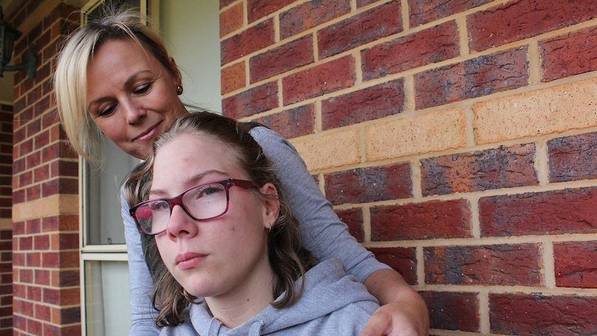 Ann Betts and her 14 year-old daughter Ashley, outside their home in Ballarat