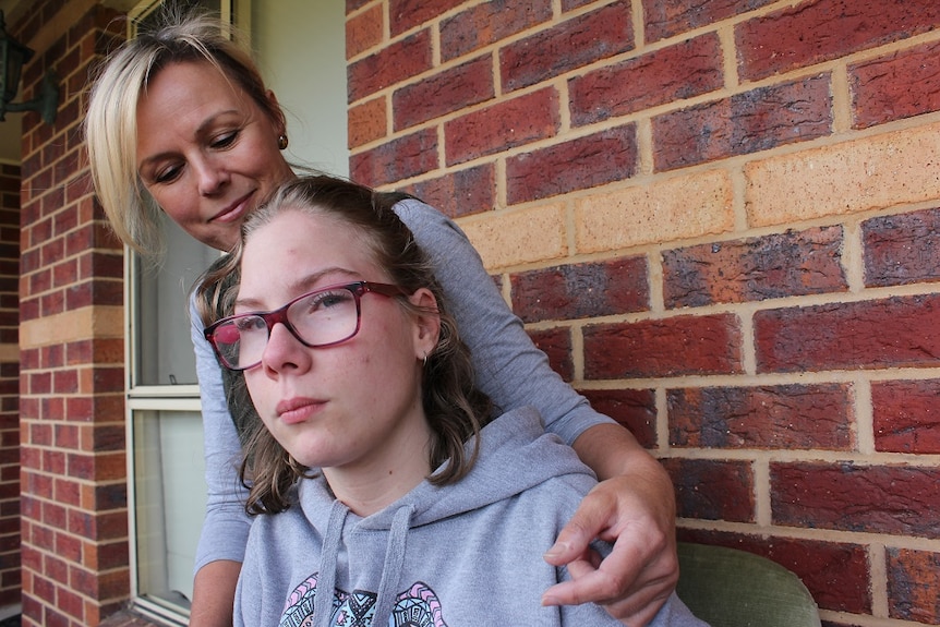 Ann Betts and her 14 year-old daughter Ashley, outside their home in Ballarat