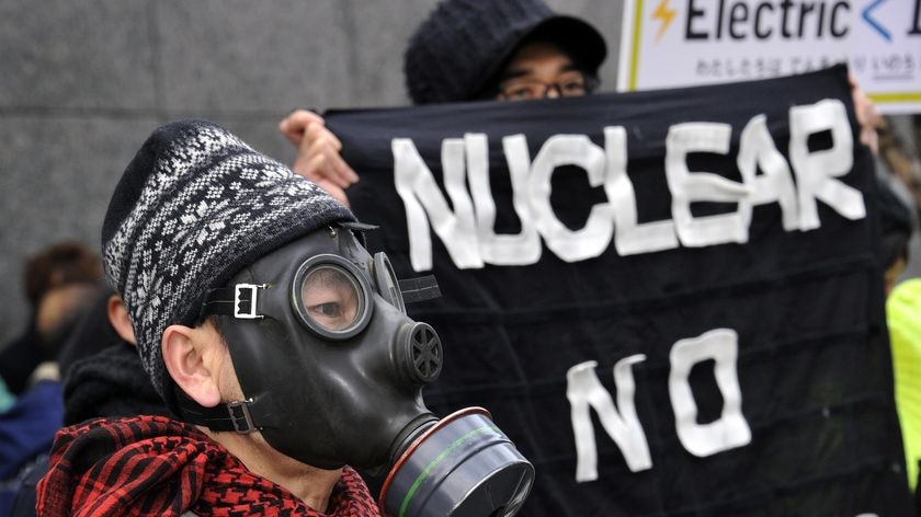 Backlash: Anti-nuclear protesters outside TEPCO's headquarters in Tokyo.