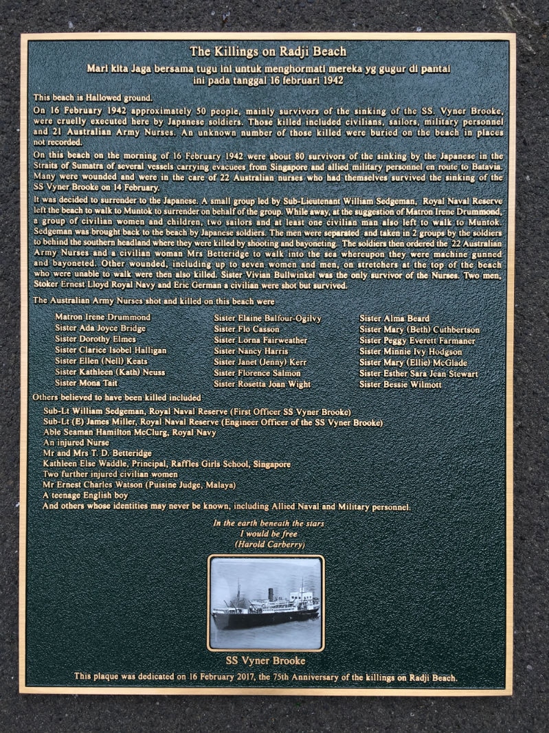 A plaque on Radji Beach.