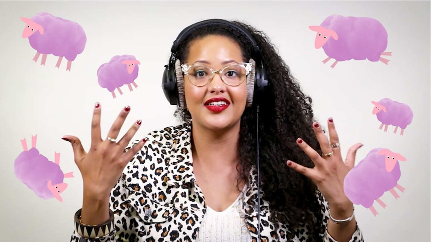 A woman listening to music on headphones surrounded by lilac sheep.