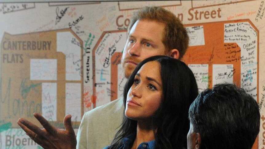 Prince Harry and Meghan both up as they are given a guided tour