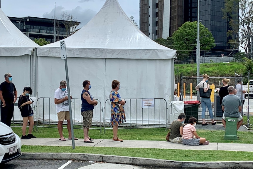 People line up outside a COVID testing clinic on the Gold Coast