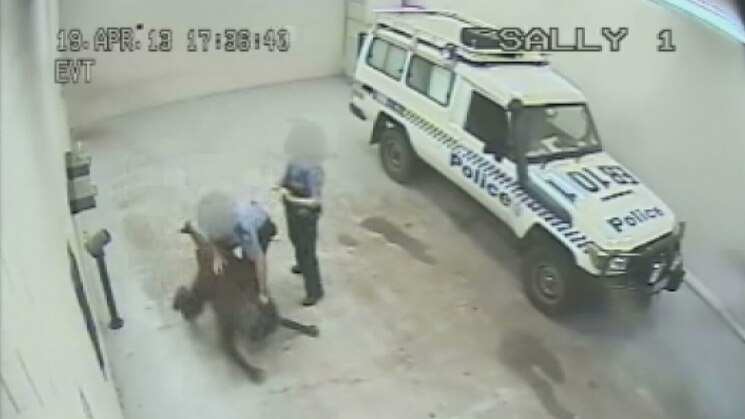 A prisoner about to hit the concrete floor in the Broome lockup