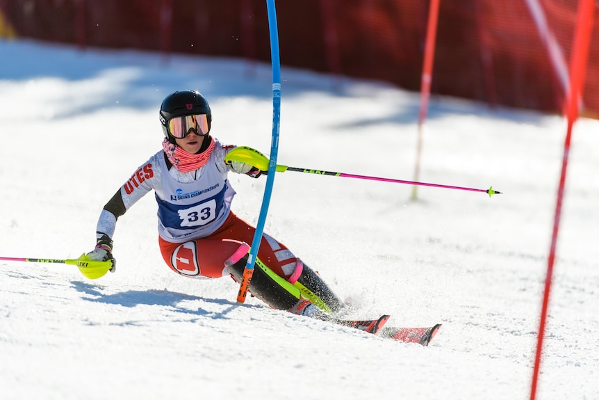 A female alpine skier competes in a slalom race in the United States.