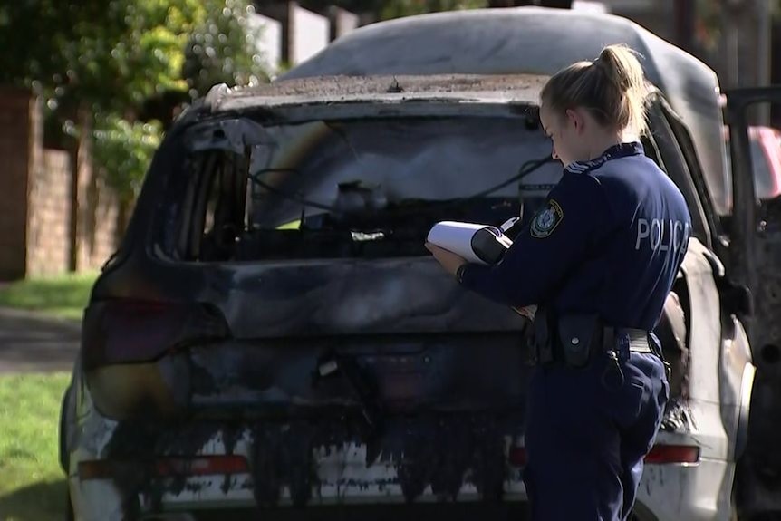 Police investigate three burnt-out cars near Revesby shooting scene