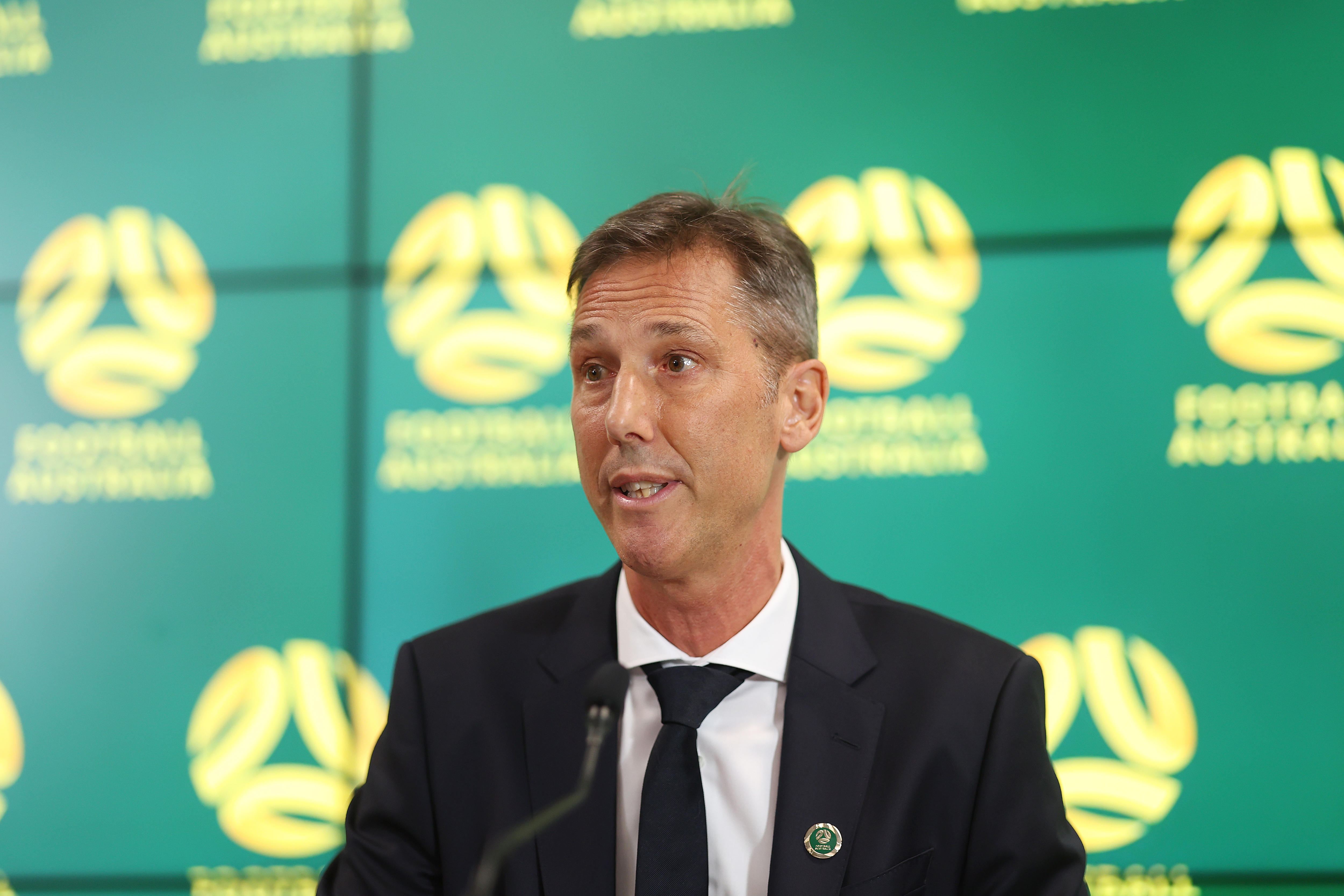 Martin Kugeler speaks to reporters