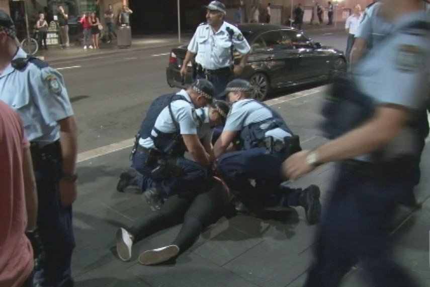 Police detain man amid brawls in Sydney
