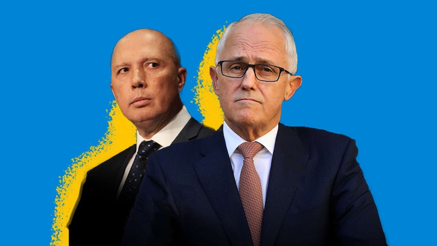 Peter Dutton stands behind Malcolm Turnbull, a famous example of a work place colleague relationship breakdown.