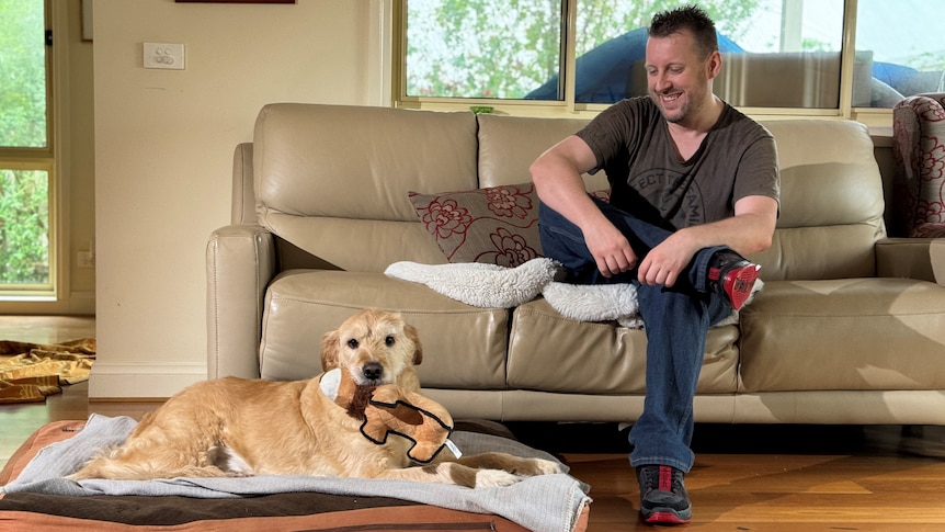 a man and a dog on a couch