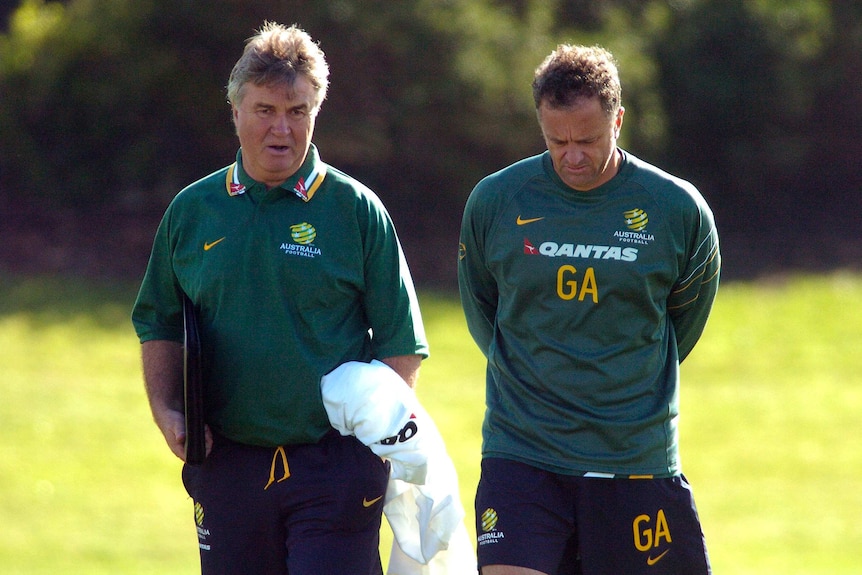 Socceroos coach Guus Hiddink (left) and Assistant Coach Graham Arnold discuss training.