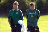 Socceroos coach Guus Hiddink (left) and Assistant Coach Graham Arnold discuss training.