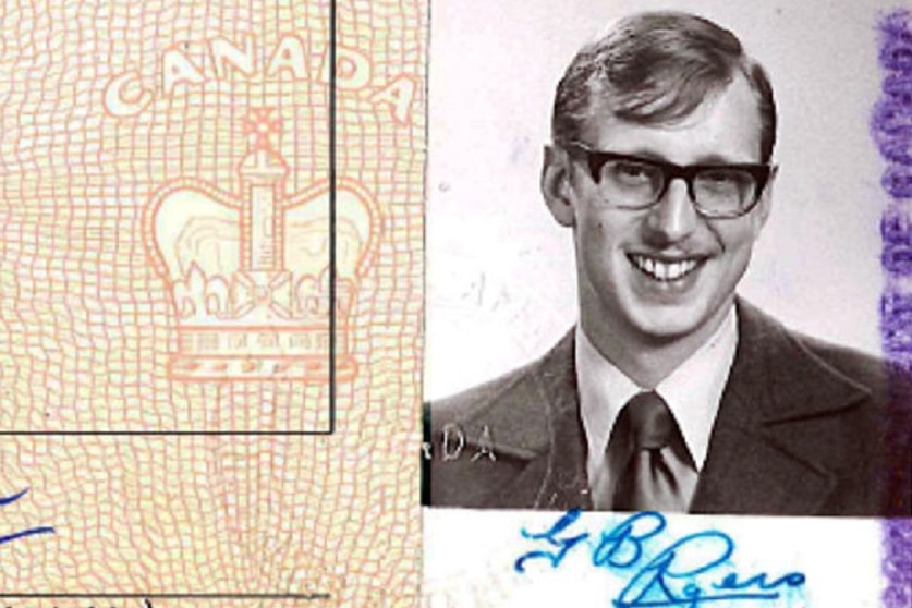 A stamp of a crown and "Canada" to the left, an olden day picture of a young man with glass on the right